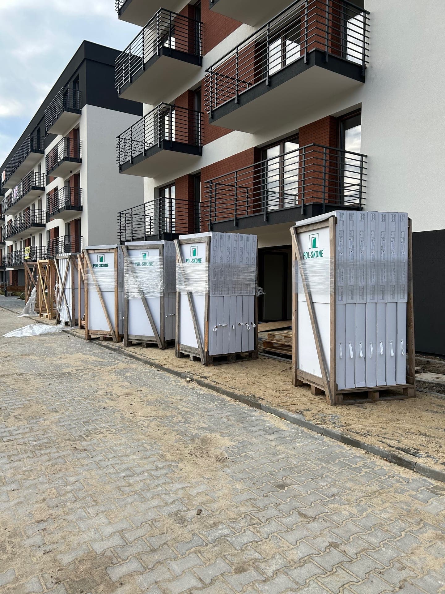 Interior door delivery to a completed apartment building